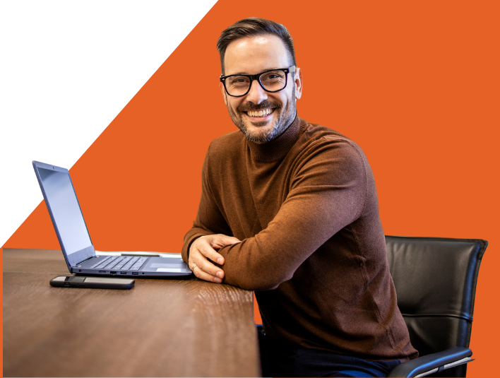 Tech professional smiling with tablet